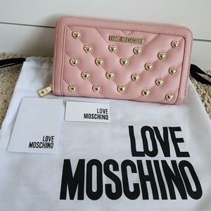 New Love Moschino golden heart stud wallet.